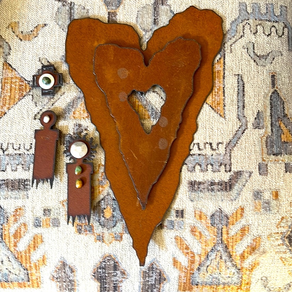 Metal art wall hanging with decorative stones